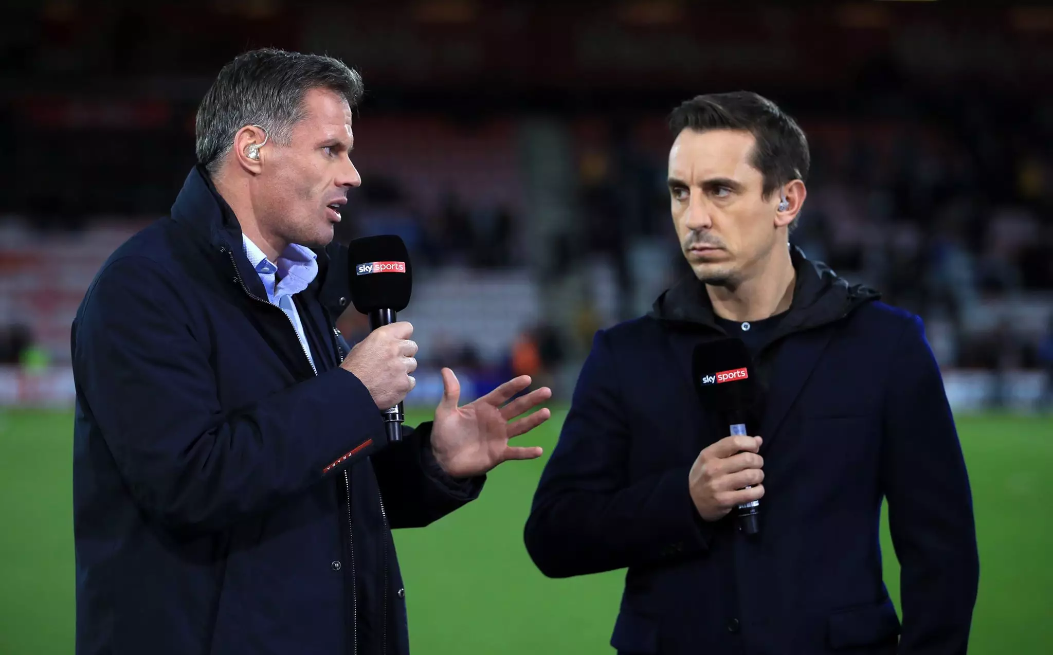 Carrager and Neville working for Sky. Image: PA