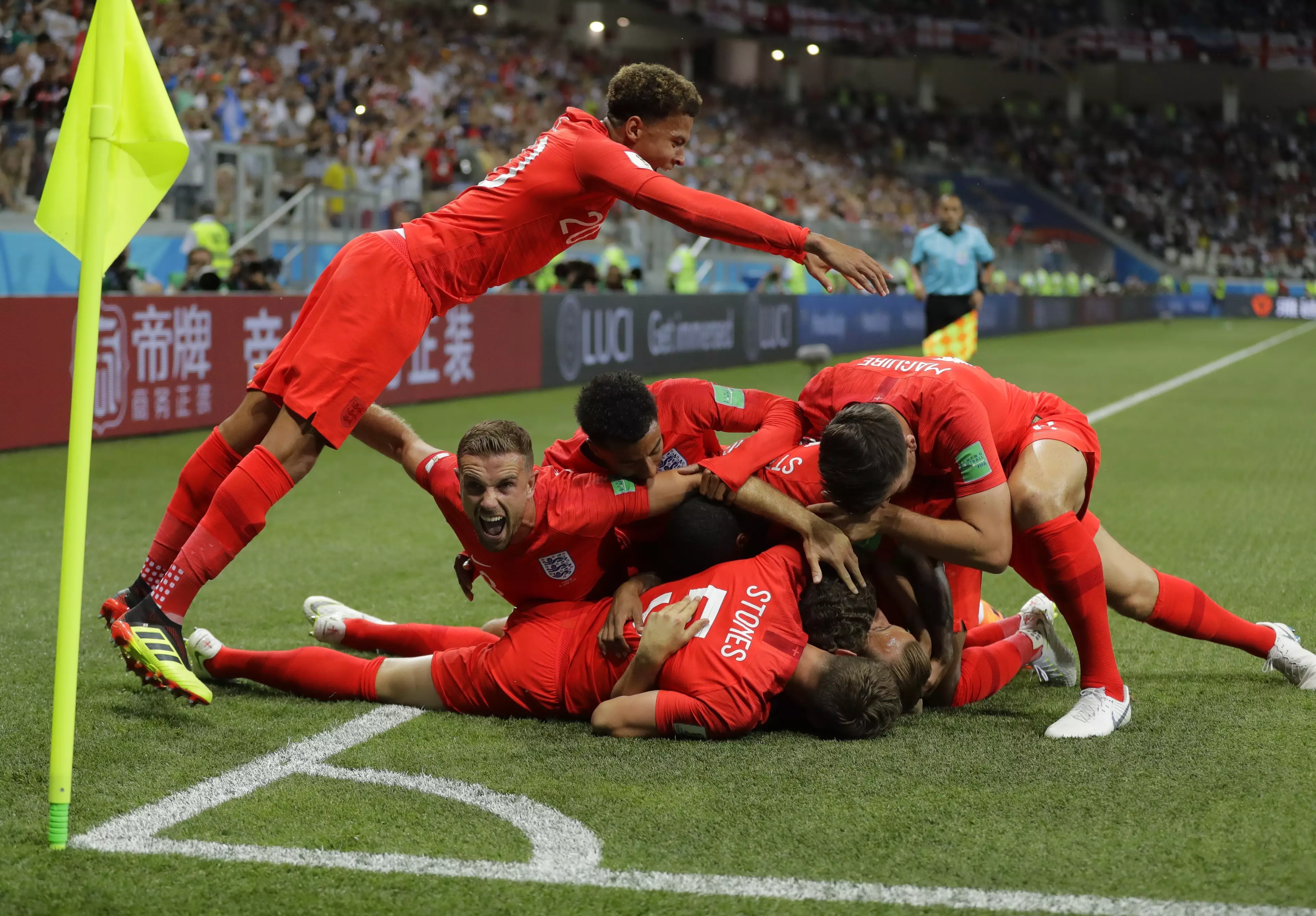 England players celebrate Kane's goal. Image: PA