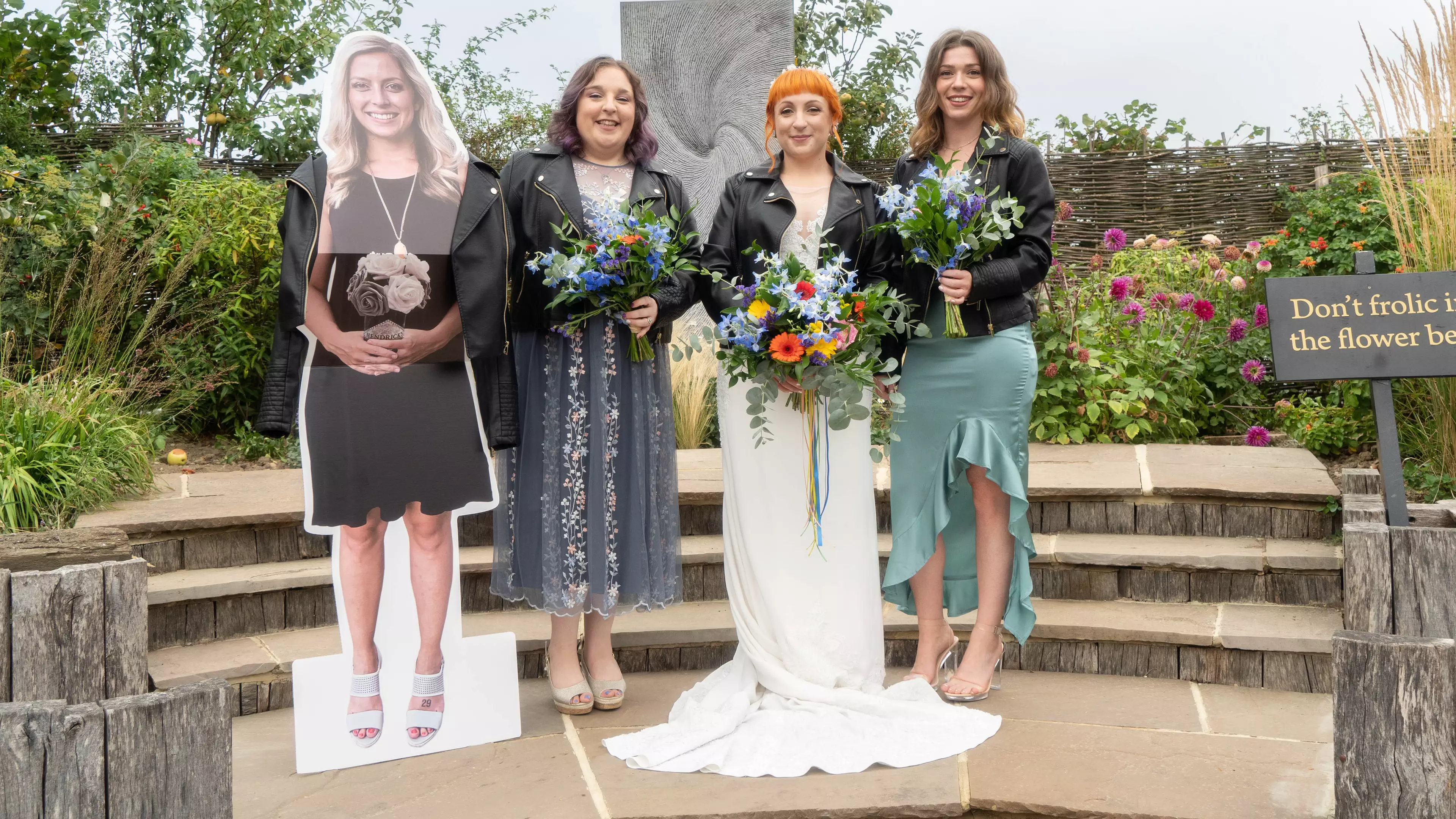 Couple Have Cardboard Cut Outs Of Their Family And Friends For Wedding