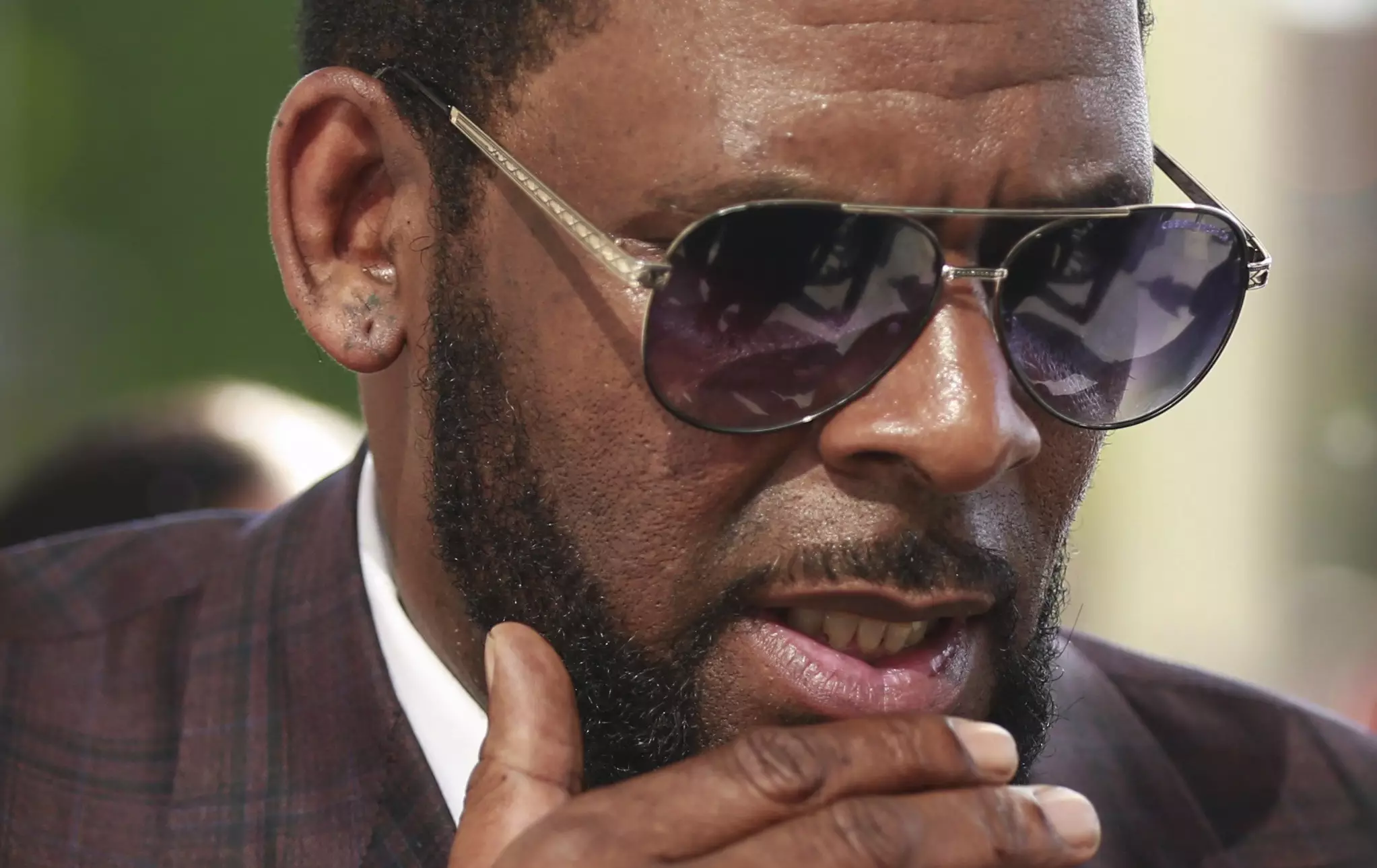 R. Kelly arriving at the Leighton Criminal Court in 2019 for arraignment on sex-related charges.