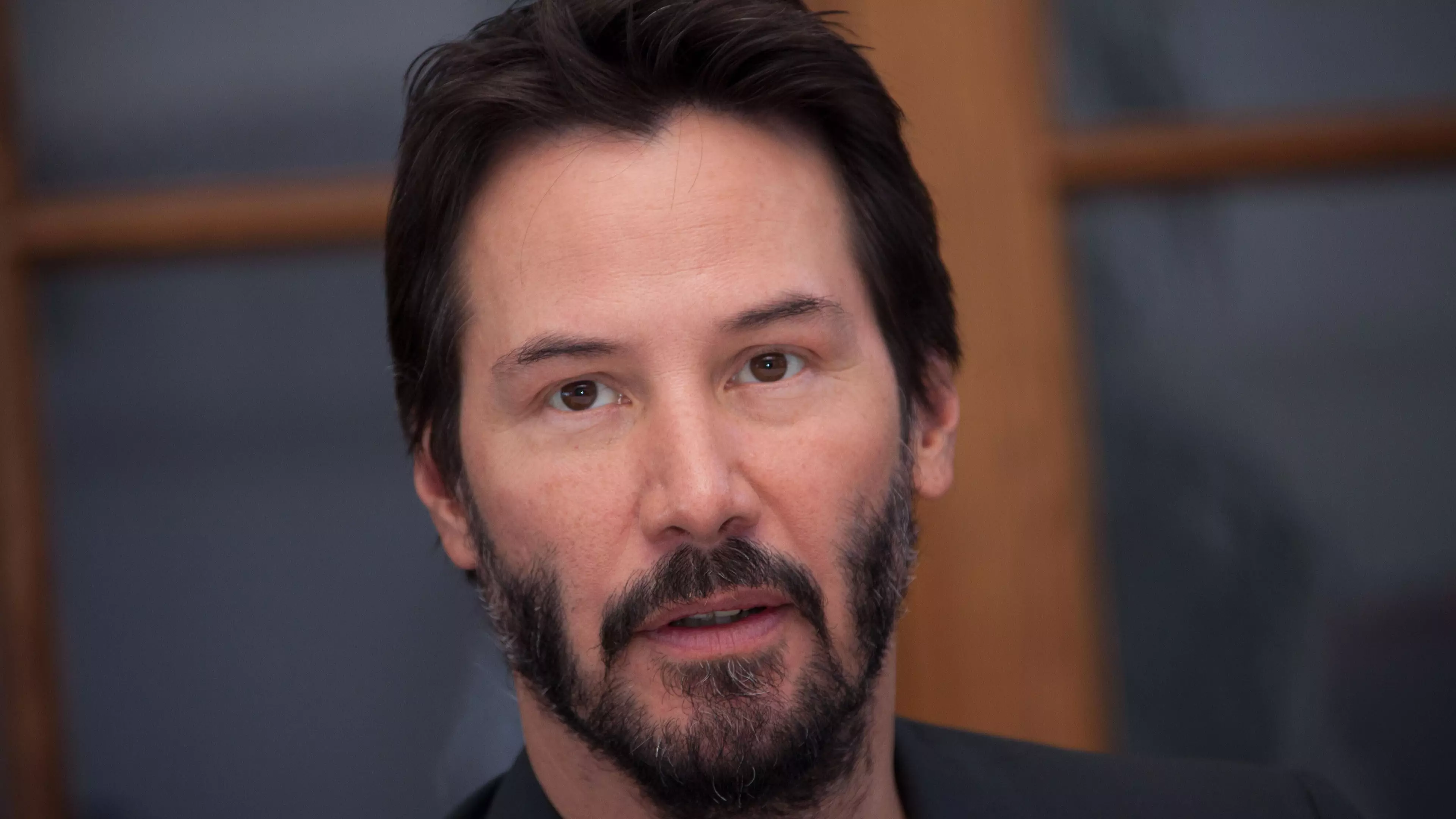 Keanu Reeves Poses For Photo At Couple's Wedding