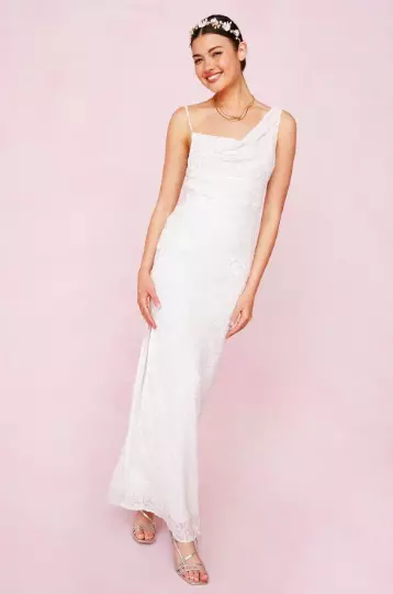 this asymmetric dress is one of the more typically bridal in the range (
