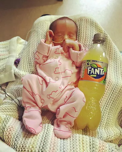 The twins were a similar size to a bottle of Fanta.