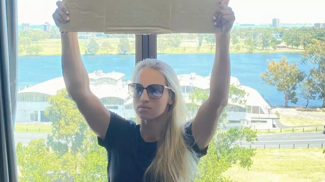 Quarantined Tennis Player Yulia Putintseva Holds Up Sign Saying 'We Need Fresh Air To Breathe'