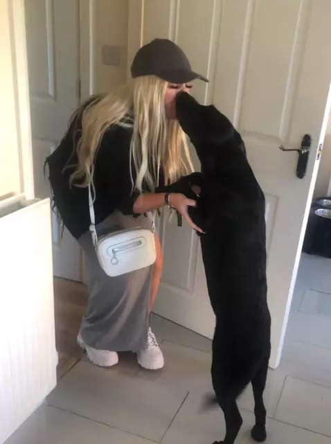 Kylie with her beloved dog Jake before he passed away.