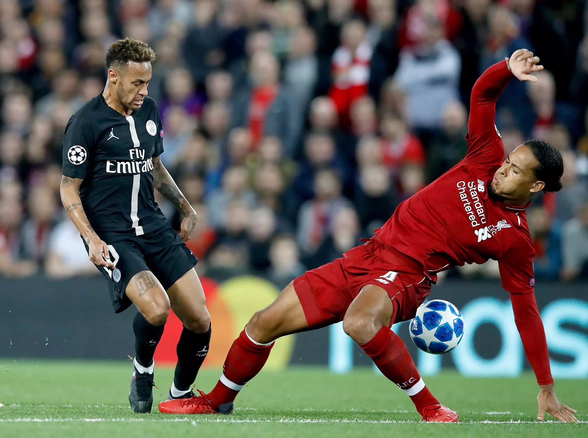 van Dijk competing with Neymar for the ball. Image: PA