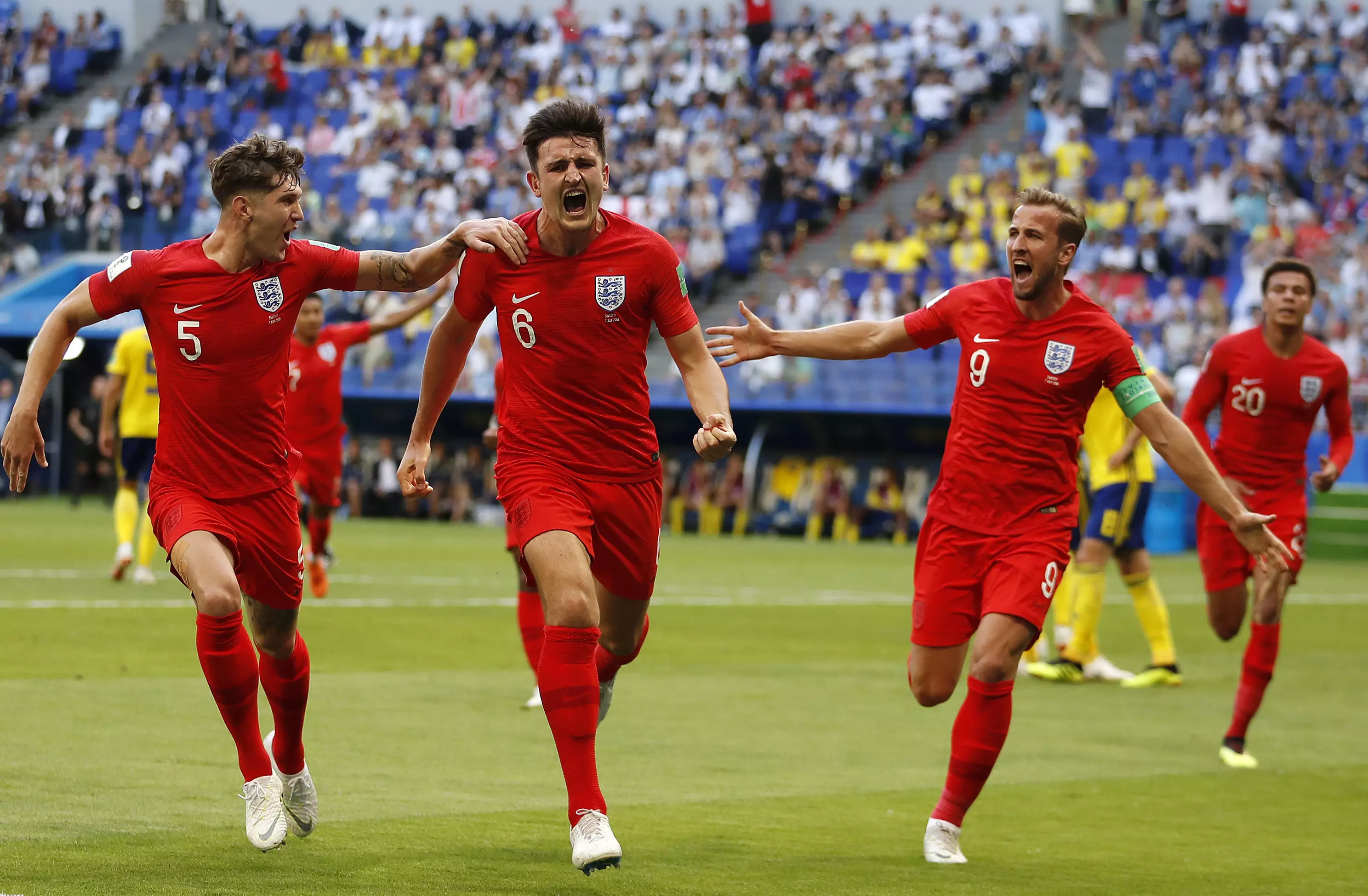 Maguire wheels away in celebration. Image: PA