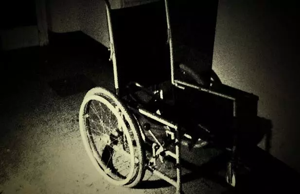 An abandoned wheelchair in the hospital (