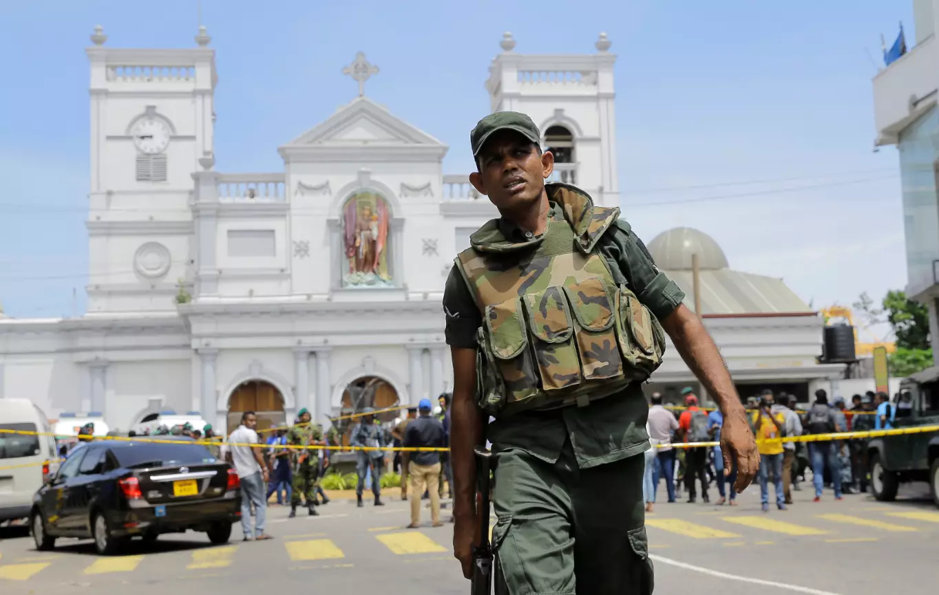 Sri Lankan Army soldiers secure the area around St. Anthony's Shrine.