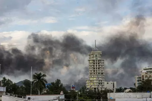 Smoke from burning cars rises due in Culiacan, Mexico.