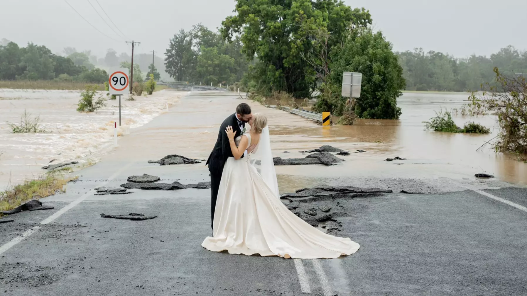 Couple Caught In Floodwaters On Wedding Day Get Airlifted To Ensure They Get Married