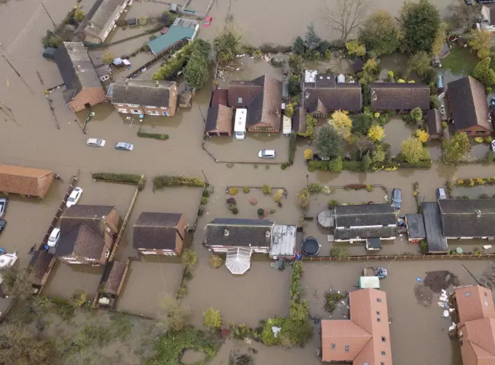 Homes and roads have been flooded but PM Boris Johnson says it is not a 'national emergency'.