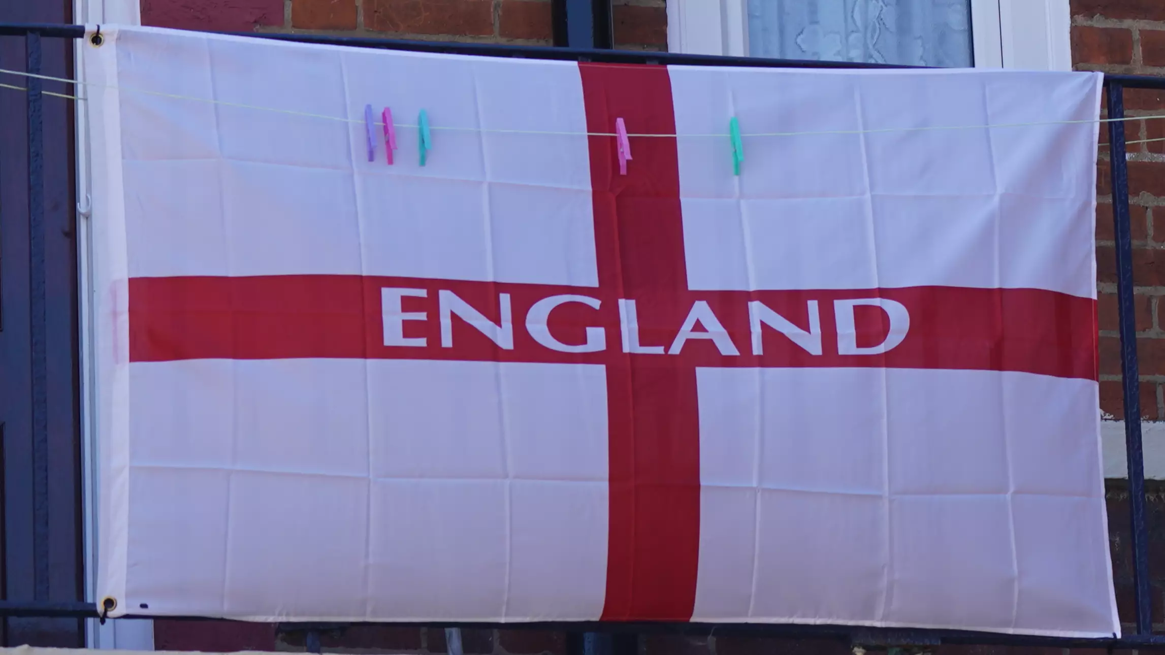 England Fan Threatened After Plastering Home With St George's Cross Flags