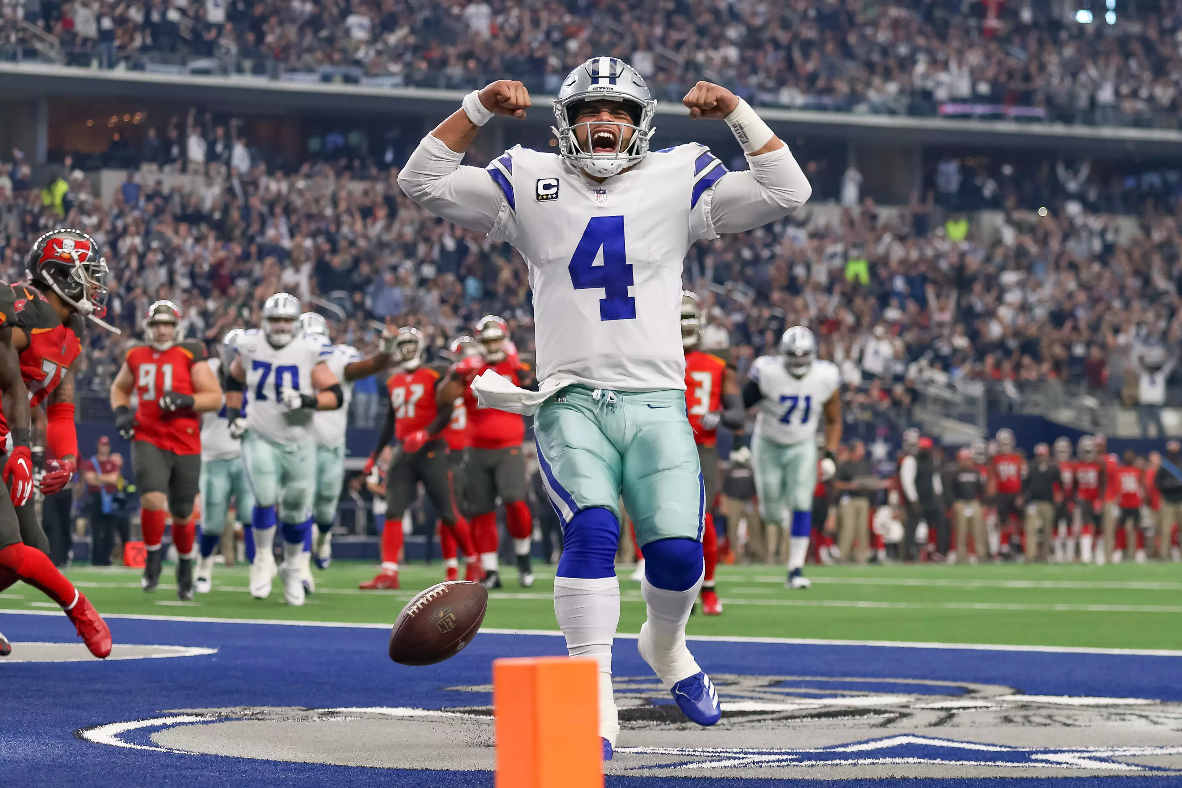 Dak Prescott celebrates after scoring a touchdown for the Dallas Cowboys