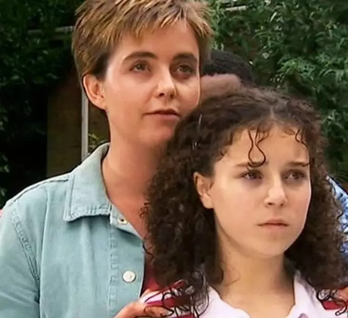 Cam adopted Tracy in the original series which aired between 2002 and 2005 (