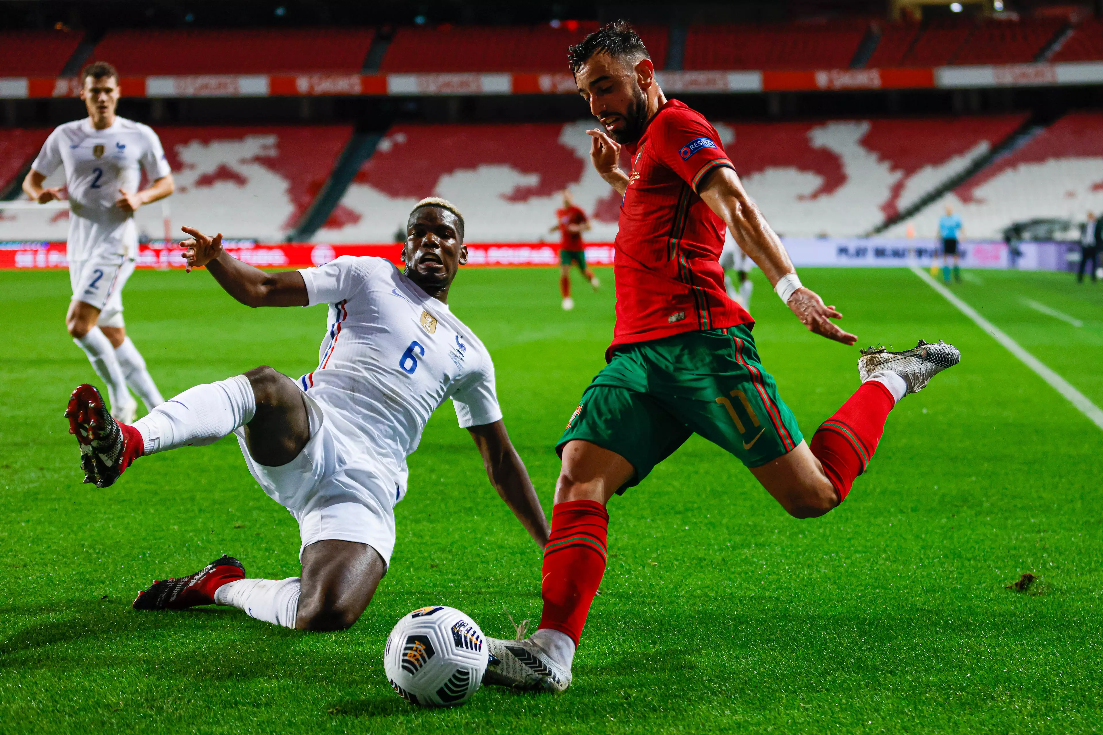 Pogba tackles United teammate Bruno Fernandes. Image: PA Images