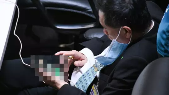 Thai MP Caught Looking At Porn On His Phone In Parliament 