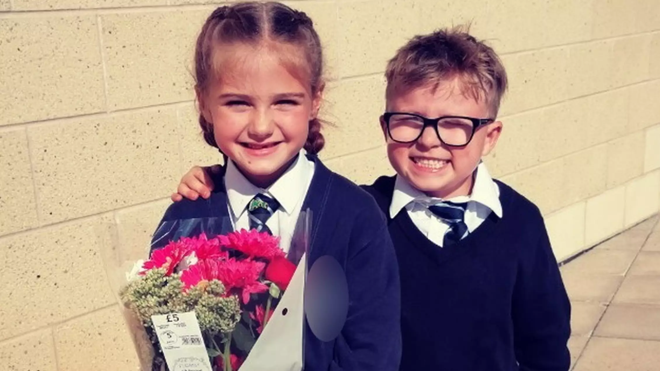Schoolboy, 7, Waits Outside Gates With Flowers To 'Win Back' Girlfriend 