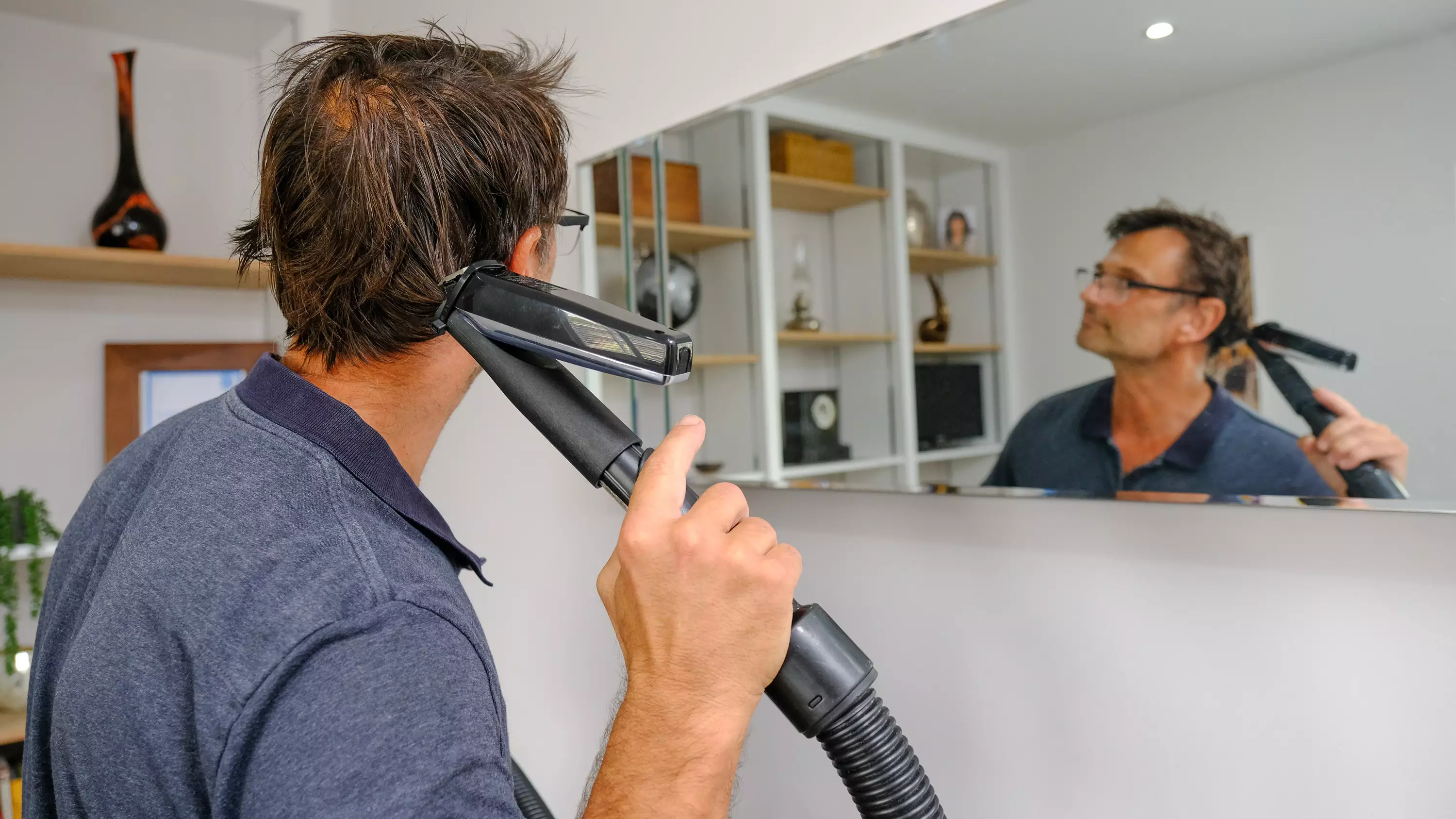 Inventor Creates Bizarre DIY Hair Trimmer Using Clippers And Vacuum Cleaner