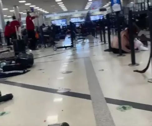 Atlanta Airport descended into chaos after a gun went off at security.