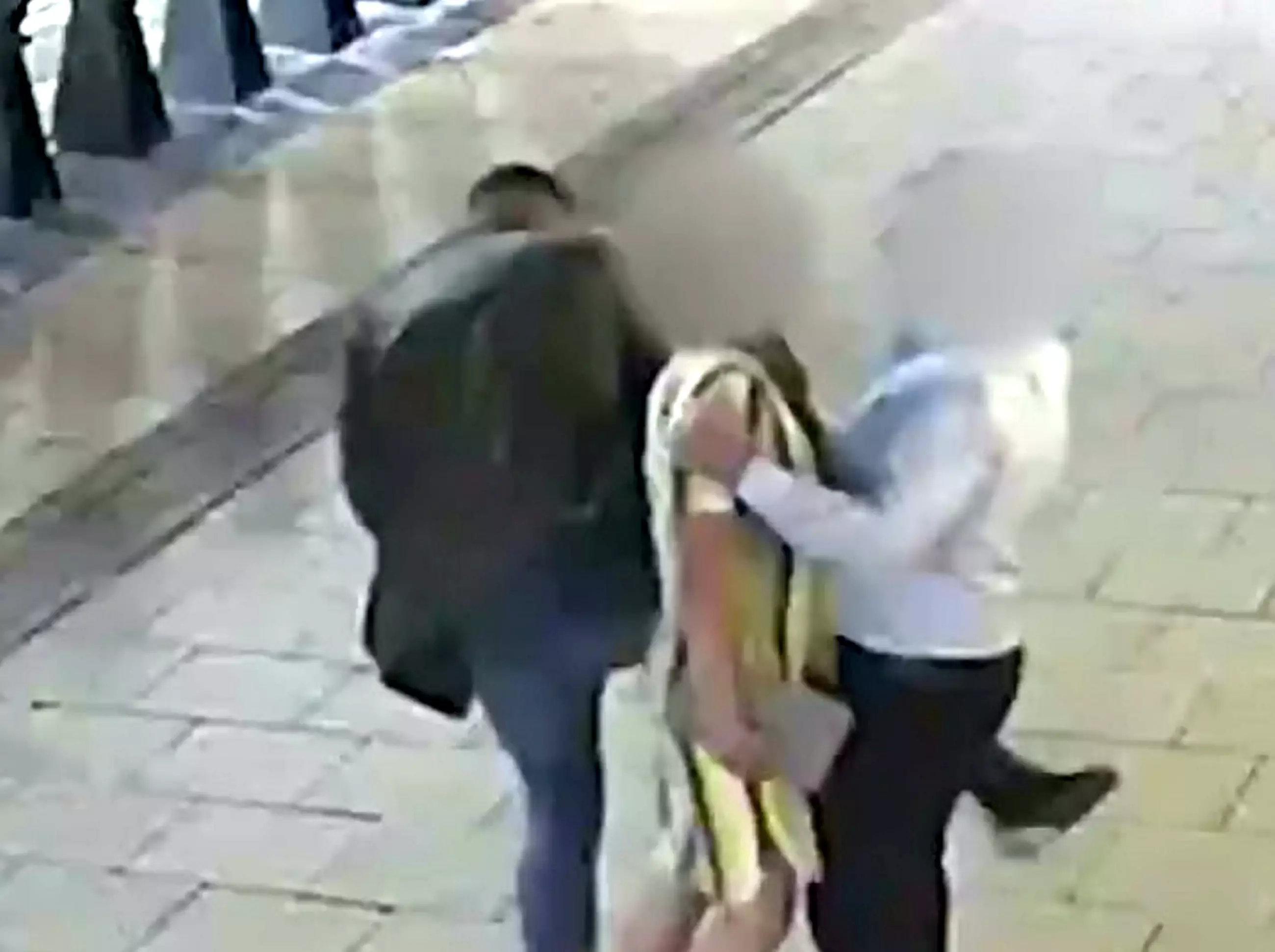 The pickpocket using the distraction technique known as the 'Ronaldinho'.