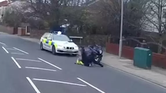 Shocking Footage Shows Motorcyclist Attacking A Police Officer