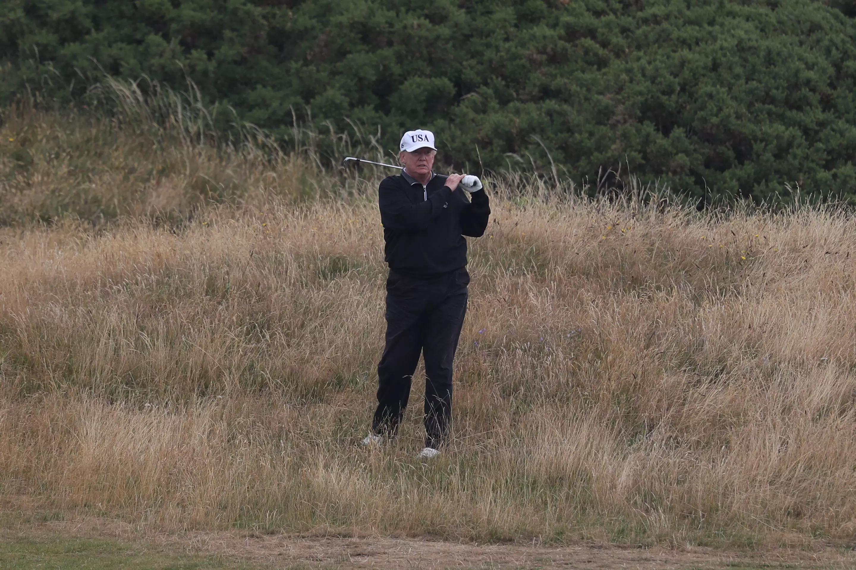 Trump plays out of the rough at Turnberry.