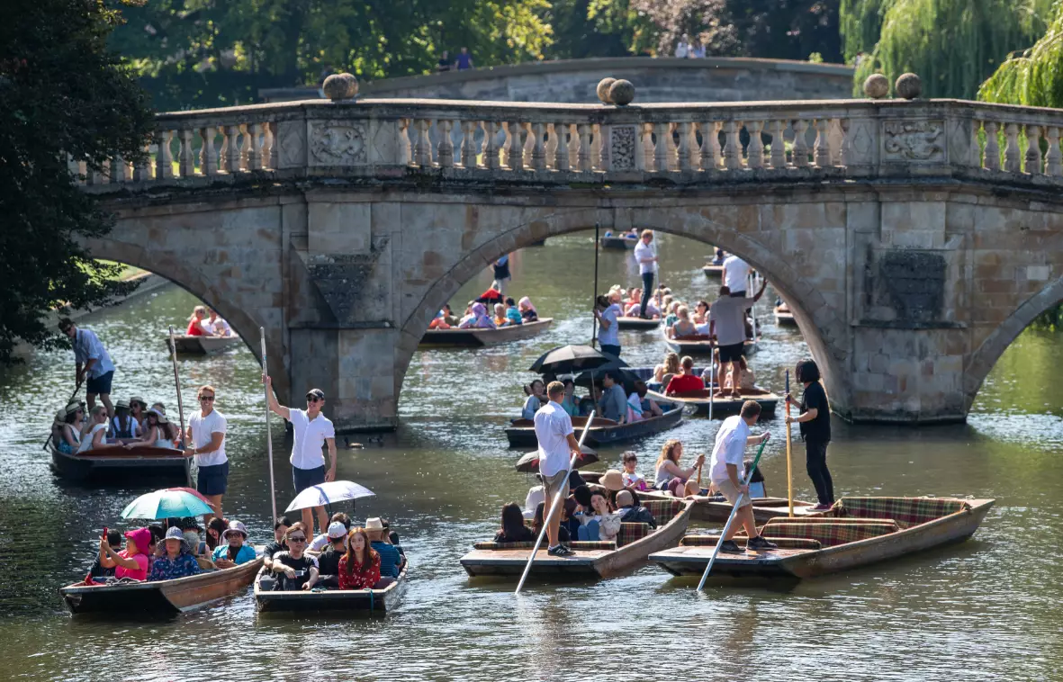 People punting along the River Cam in Cambridge on 25 August.