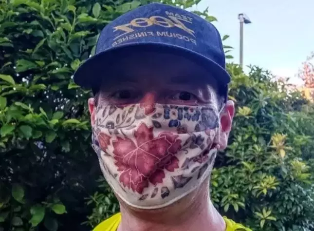Tom Lawton ran 22 miles while wearing a face mask to show it didn't affect his oxygen levels.