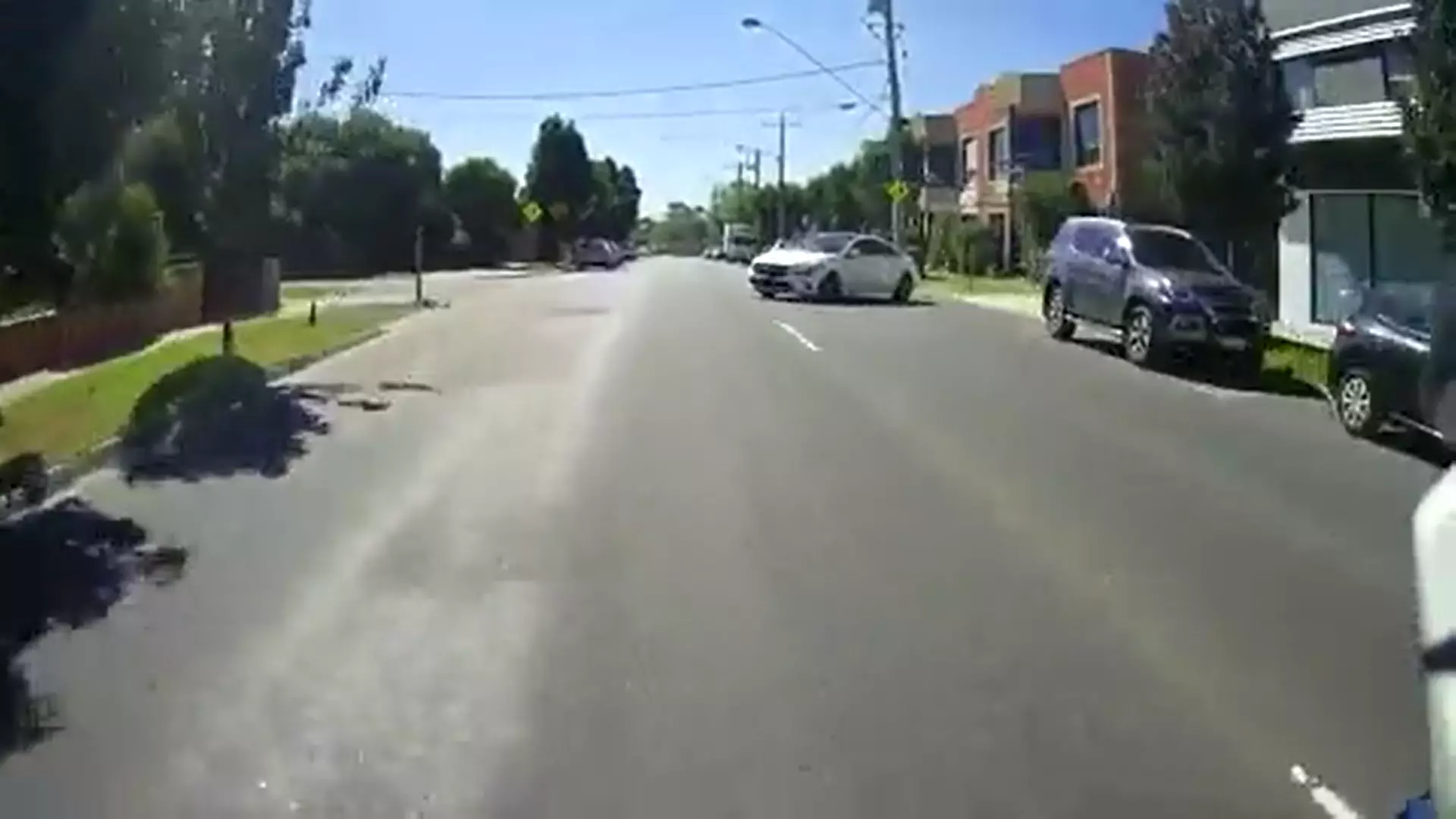 The biker braked but couldn't avoid the crash.