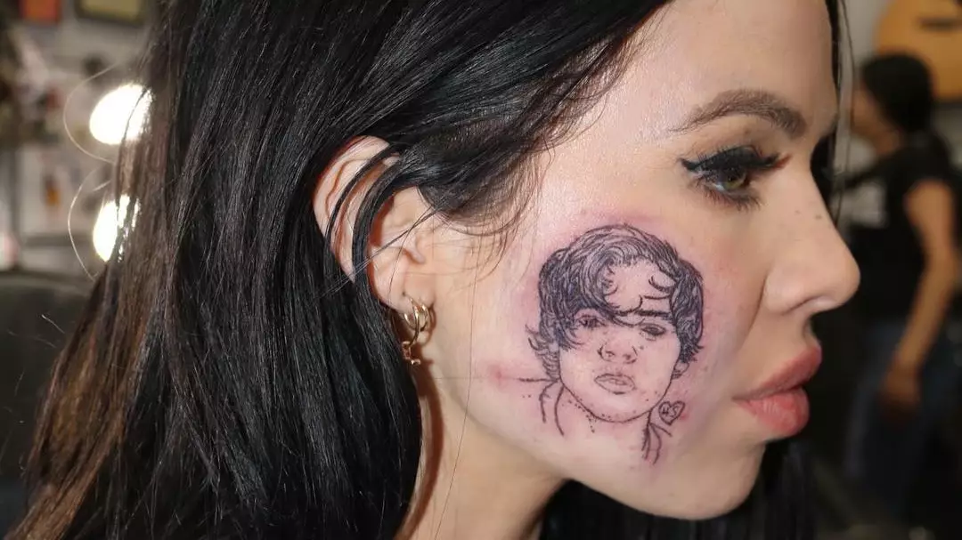 Singer Kelsy Karter Gets Harry Styles Tattooed On Her Face