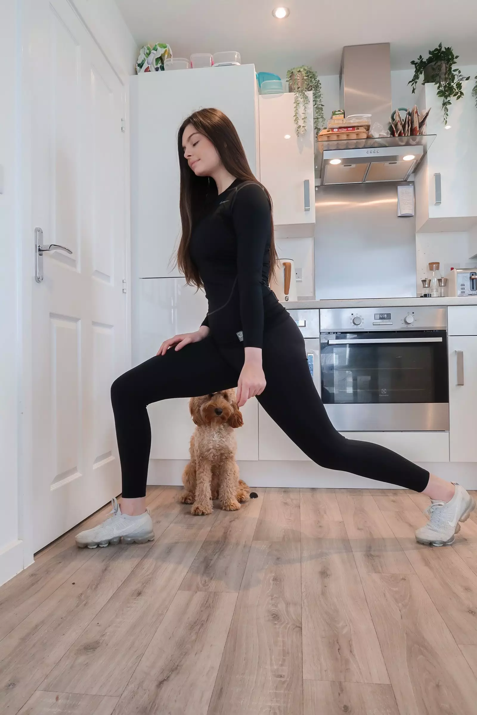 Amy suggests luring your dog with a treat when doing lunges together (