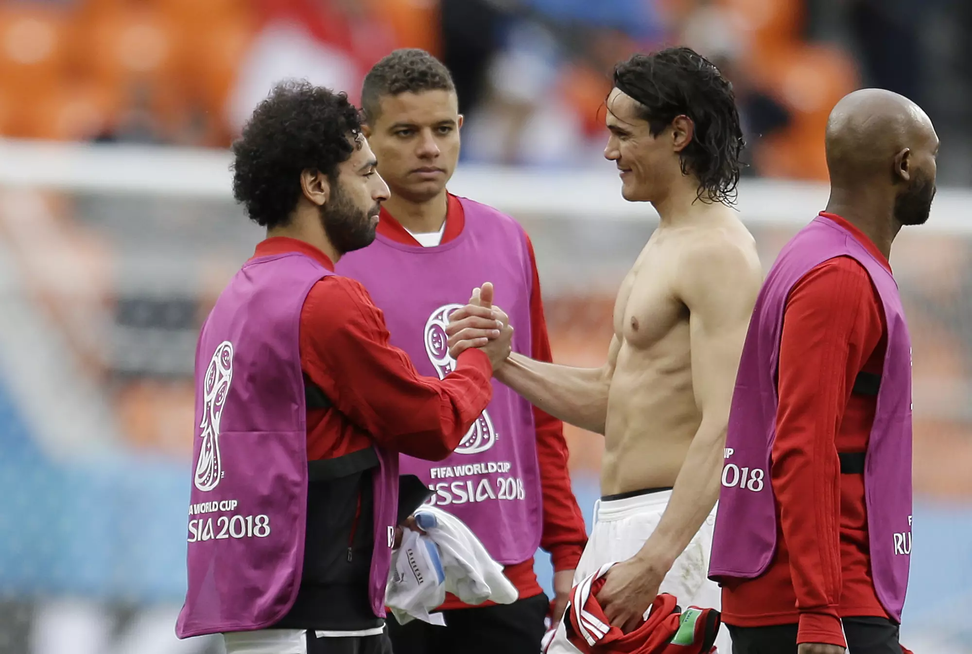 Cavani and Salah meet at the end of the game. Image: PA
