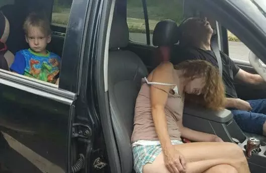 Shocking Photos Show Adults Passed Out In Car After Overdosing With Toddler In Backseat