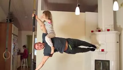 This 49-Year-Old Dad's Home Workout Routine Will Put You To Shame