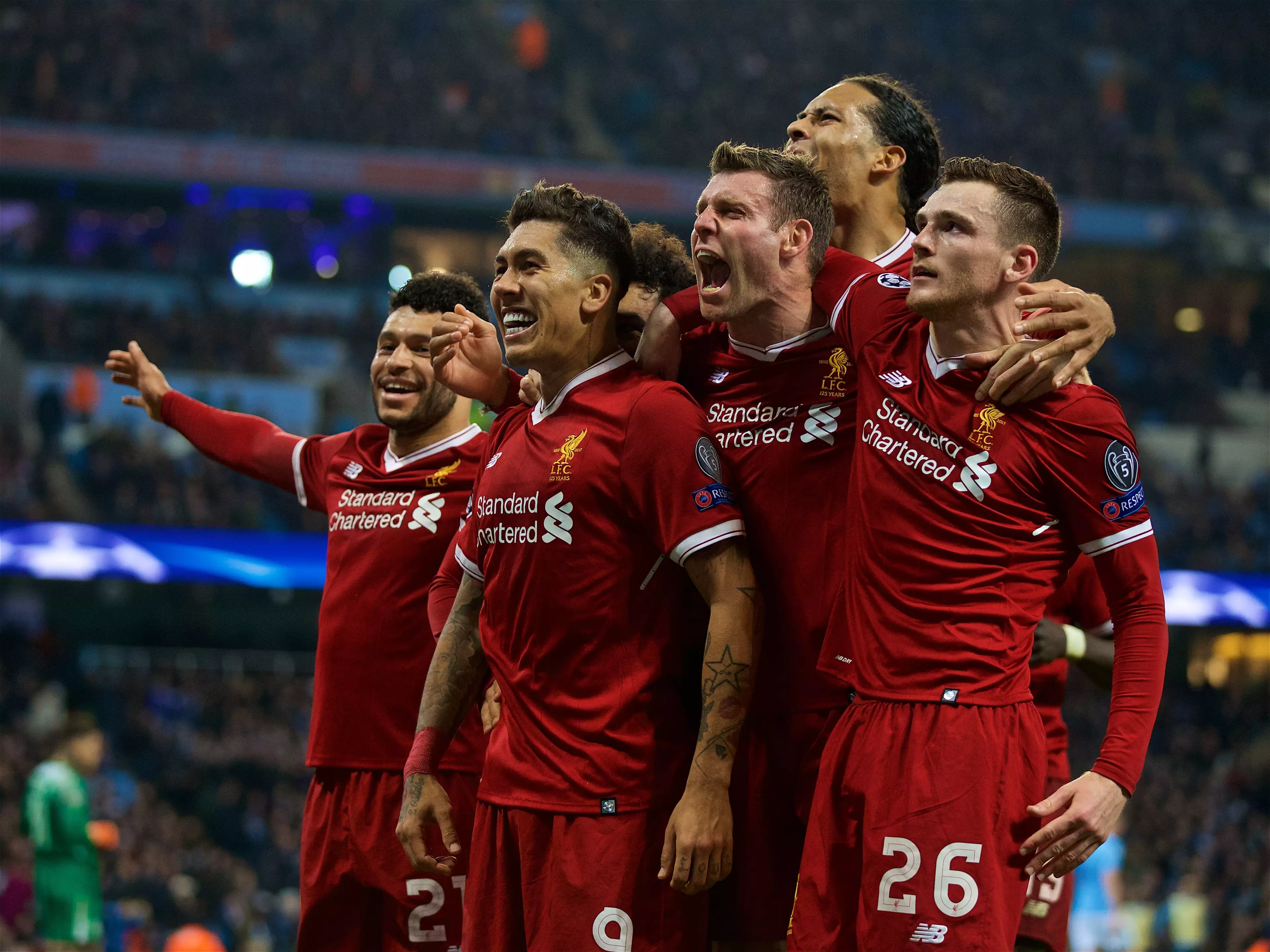 Liverpool players celebrate scoring a goal. Image: PA