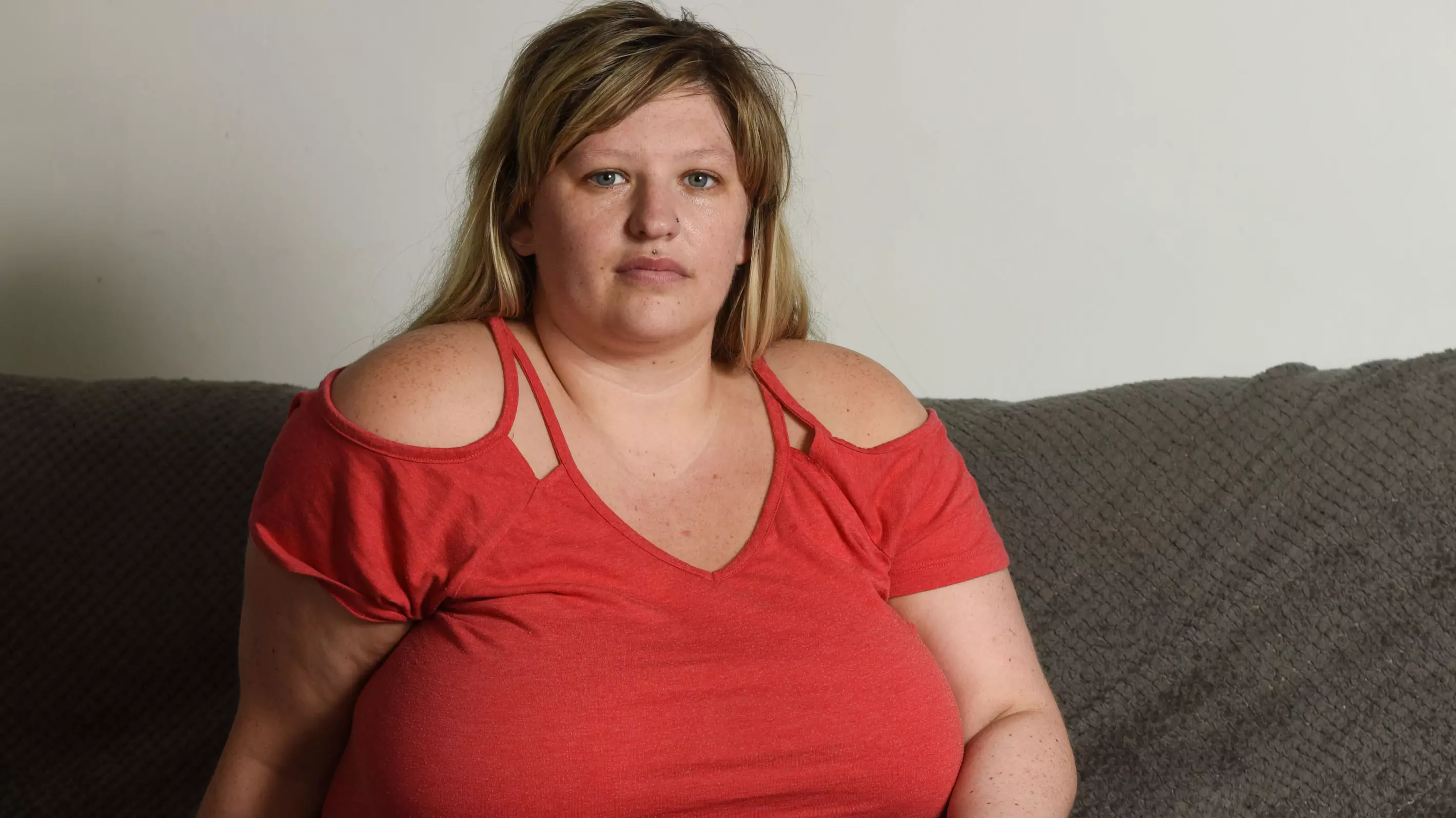 Woman Left In Wheelchair After Breasts Caused Spine To Collapse