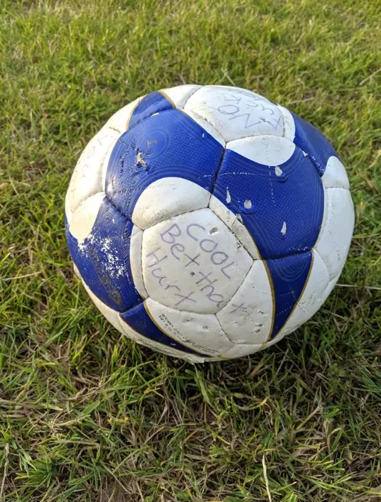 Someone had filled the ball with concrete and written messages on it.