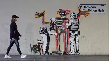 Banksy Takes Aim At London's Barbican Centre With Two New Murals 