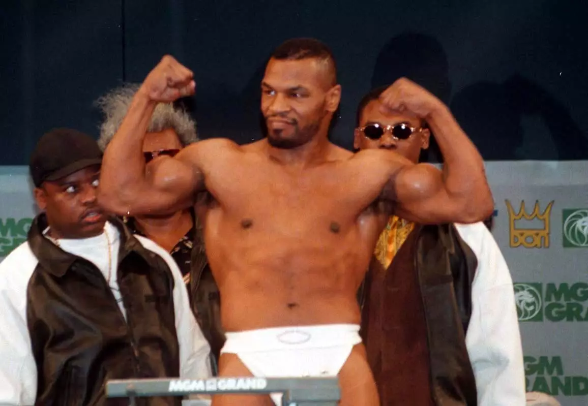 Tyson during his weigh-in for the fight with Frank Bruno. Image: PA Images