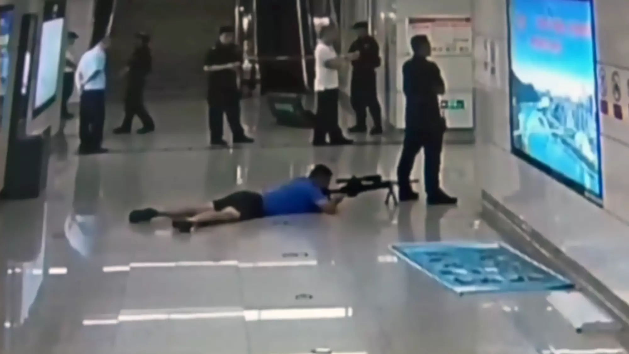 Police Sniper Shoots Hostage Taker From Between Colleague's Legs 