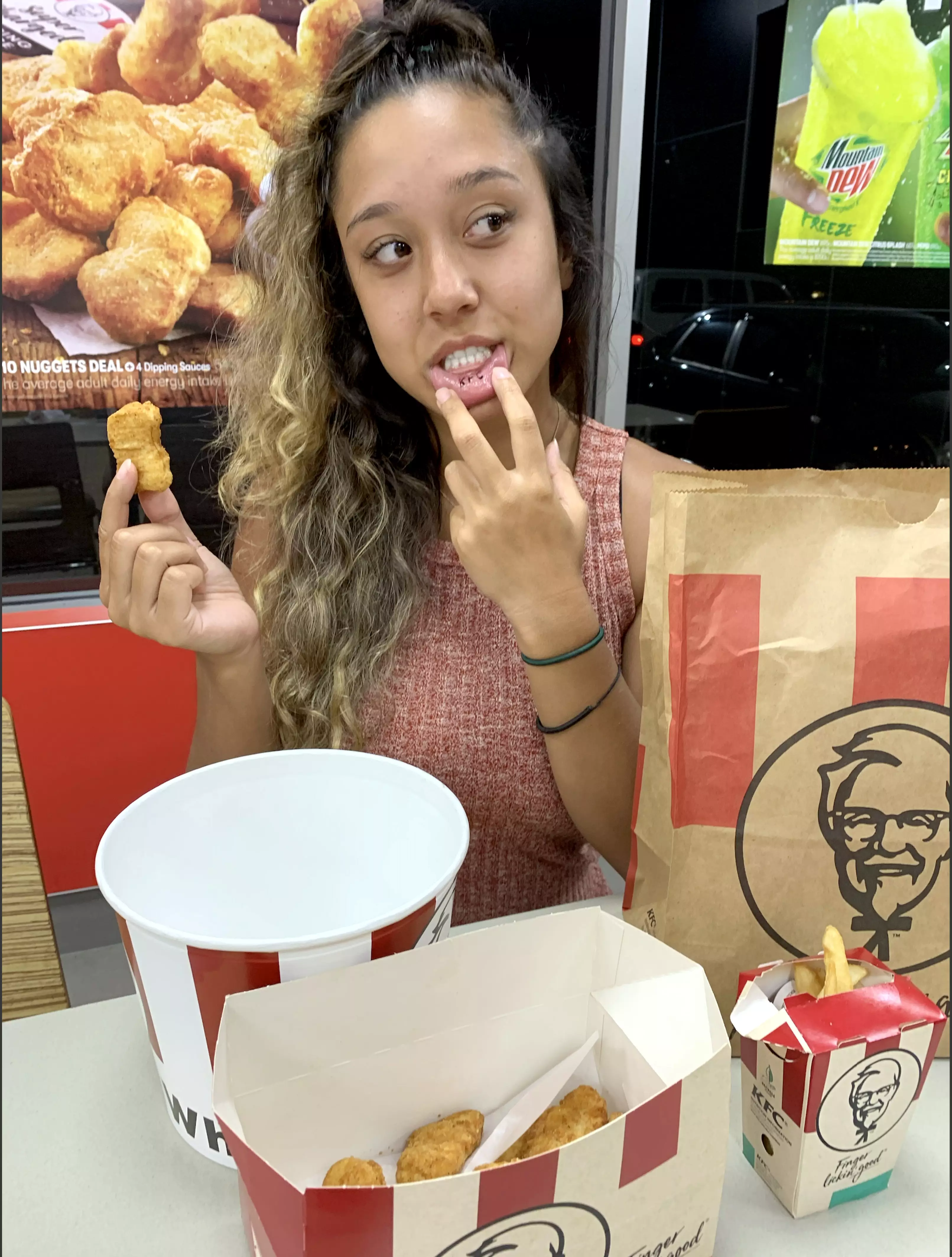 Aussie Tabatha Andrade is such a huge fan of KFC she even has a dog named 'Nugget'.