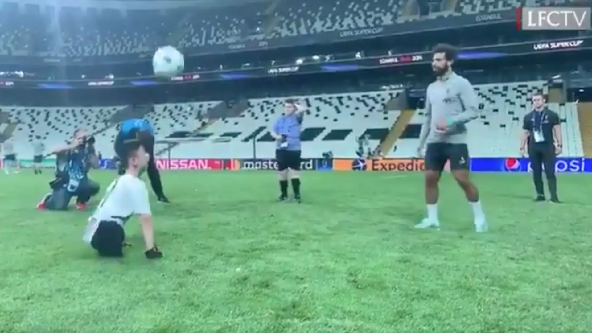 Classy Mohamed Salah Plays With Disabled Fan Ahead Of Liverpool's Super Cup Clash With Chelsea