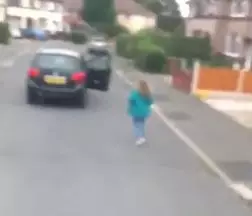 The woman legs it back to her car.