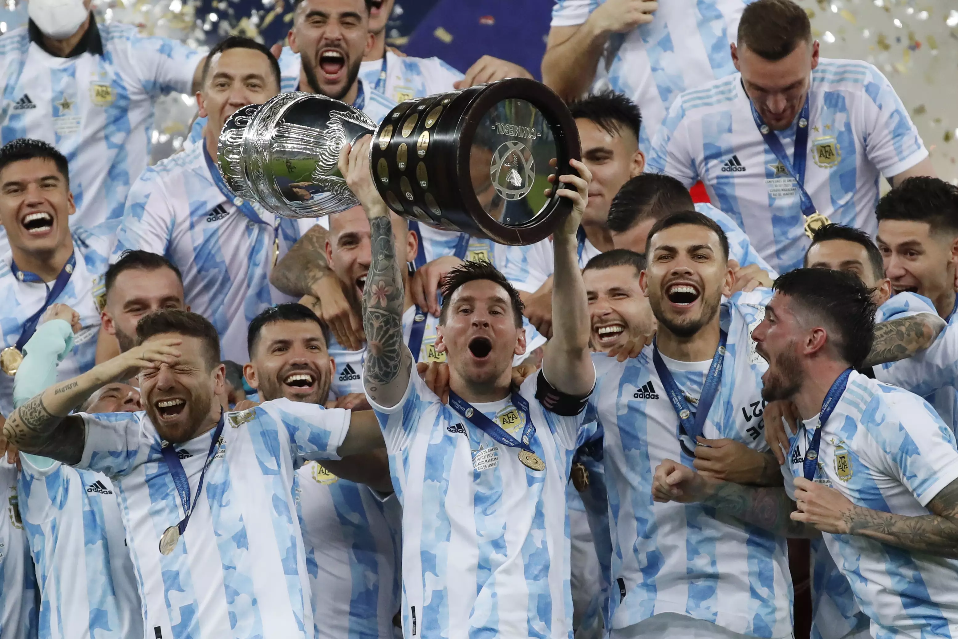 Lionel Messi hoists the trophy up after Argentina beat Brazil in the Copa America (