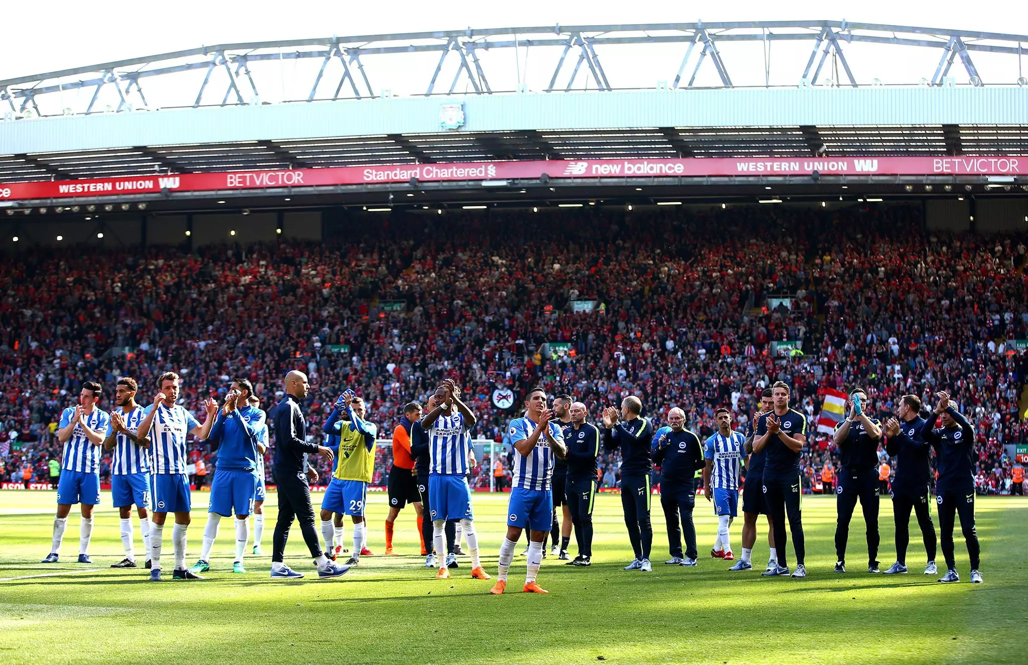 Brighton players thank the traveling fans. Image: PA