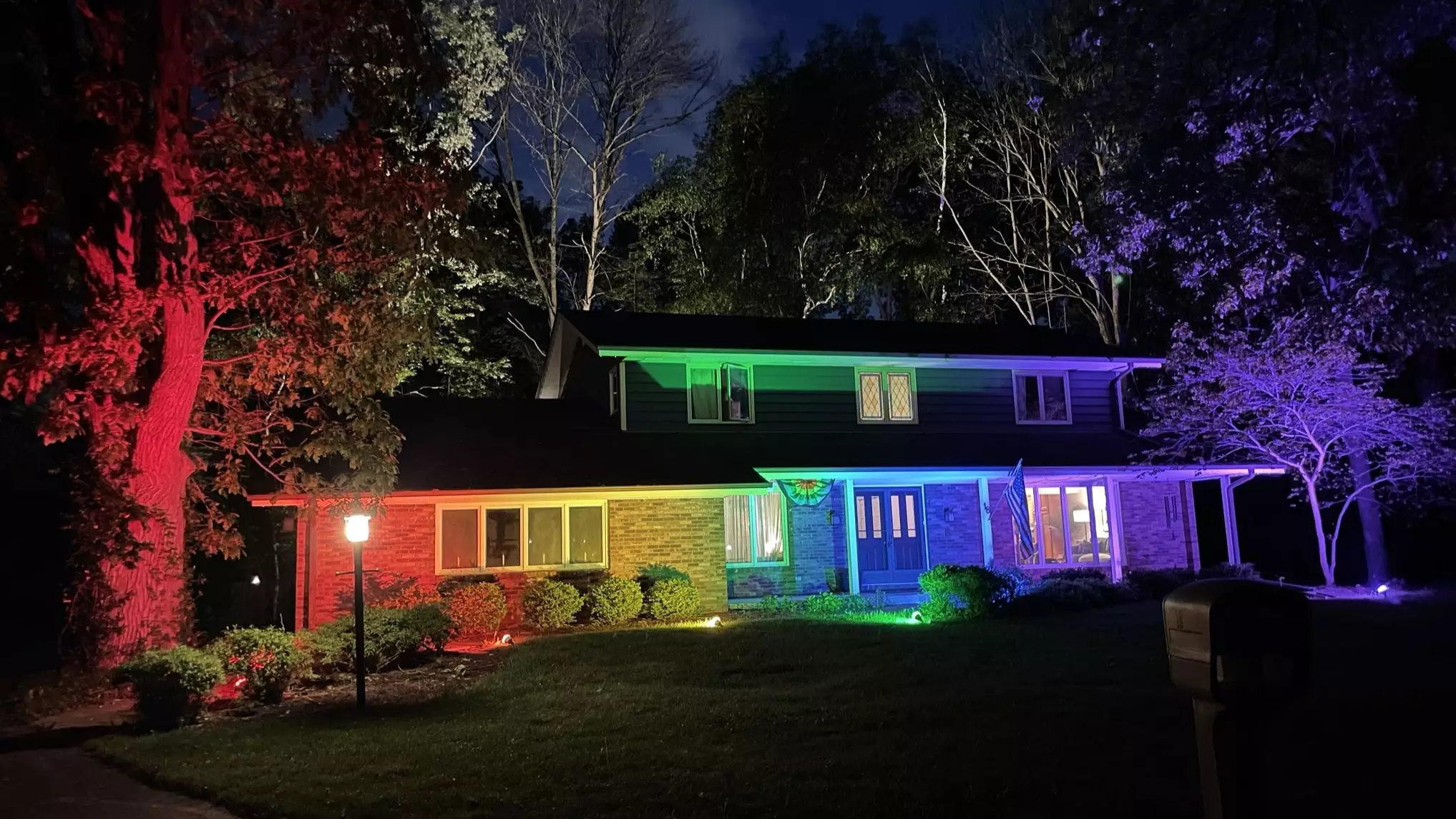 Gay Couple Bypass Flag Rules By Lighting Home Up In Rainbow Floodlights