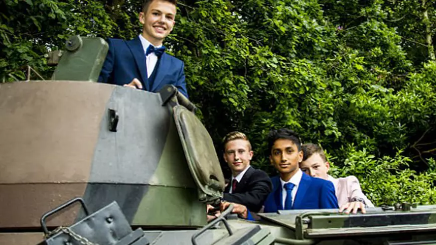 LAD Rolls Up To His School's Prom In Fully Armoured 17-Tonne Tank