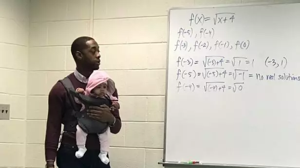 Professor Holds Student's Baby During Class Because He Can't Get A Sitter
