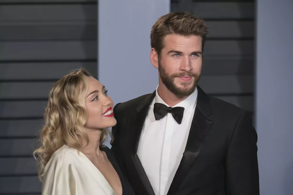 Miley Cyrus and Liam Hemsworth, pictured last year.
